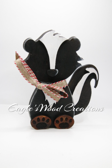 Wooden Shelf Sitting Skunk